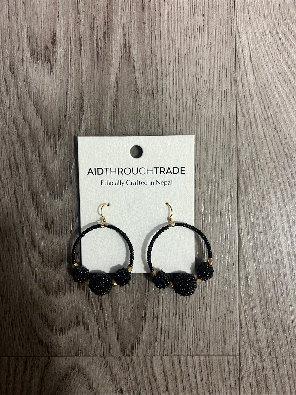 AIDTHROUGHTRADE Black Beaded Hoop Earrings